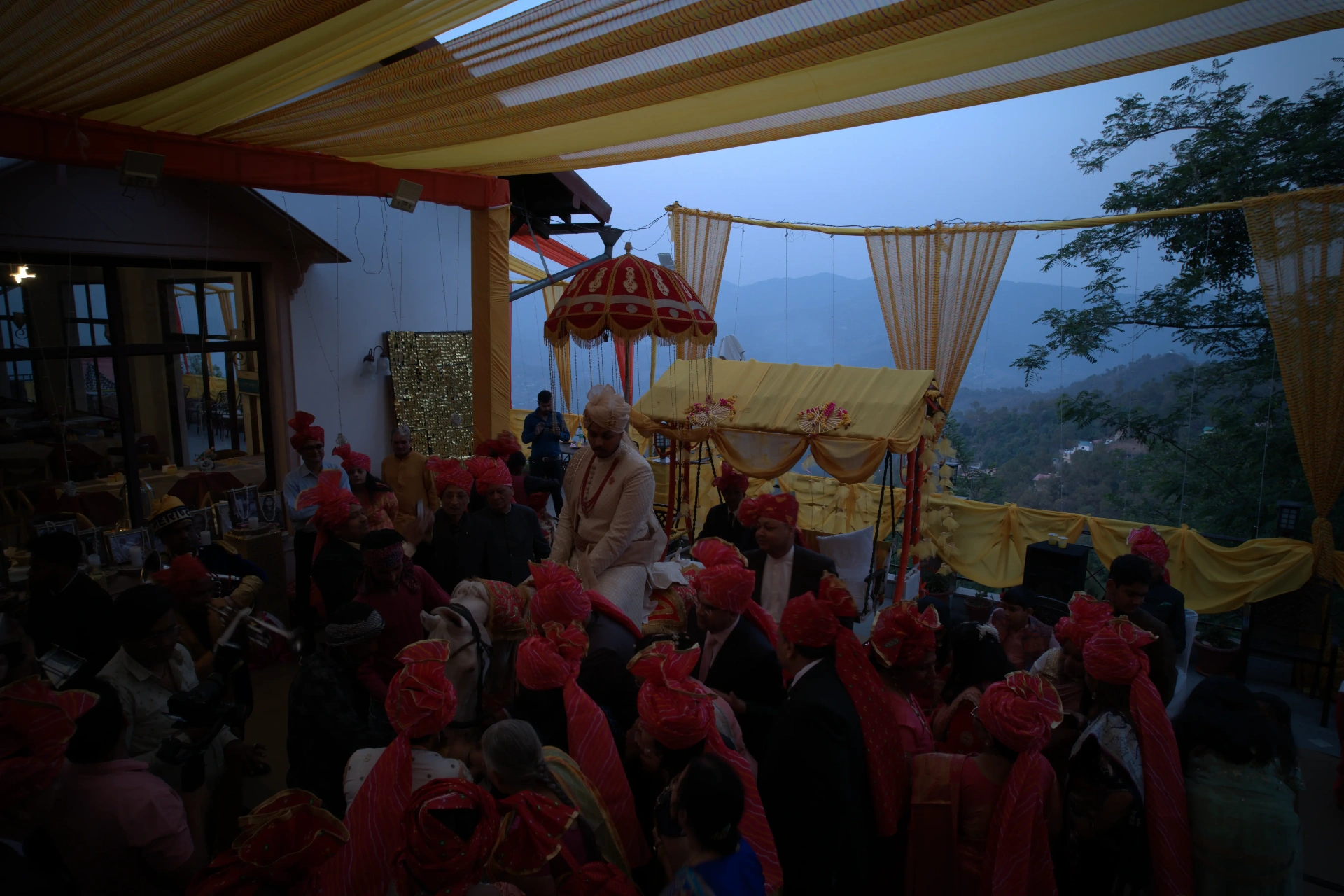 Traditional wedding ceremony with mountain backdrop
