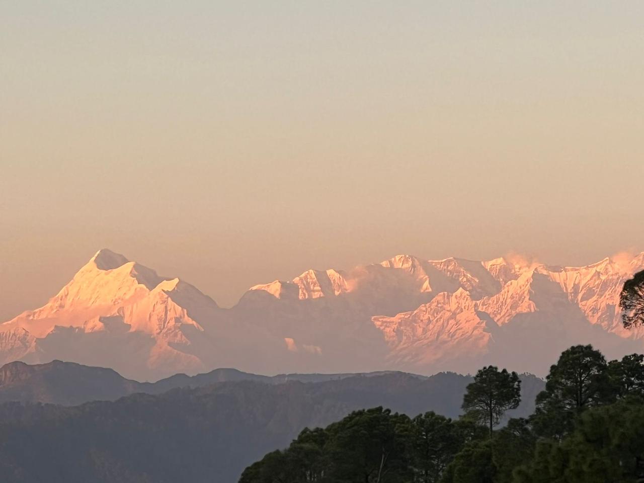 Golden sunlight on Himalayan peaks