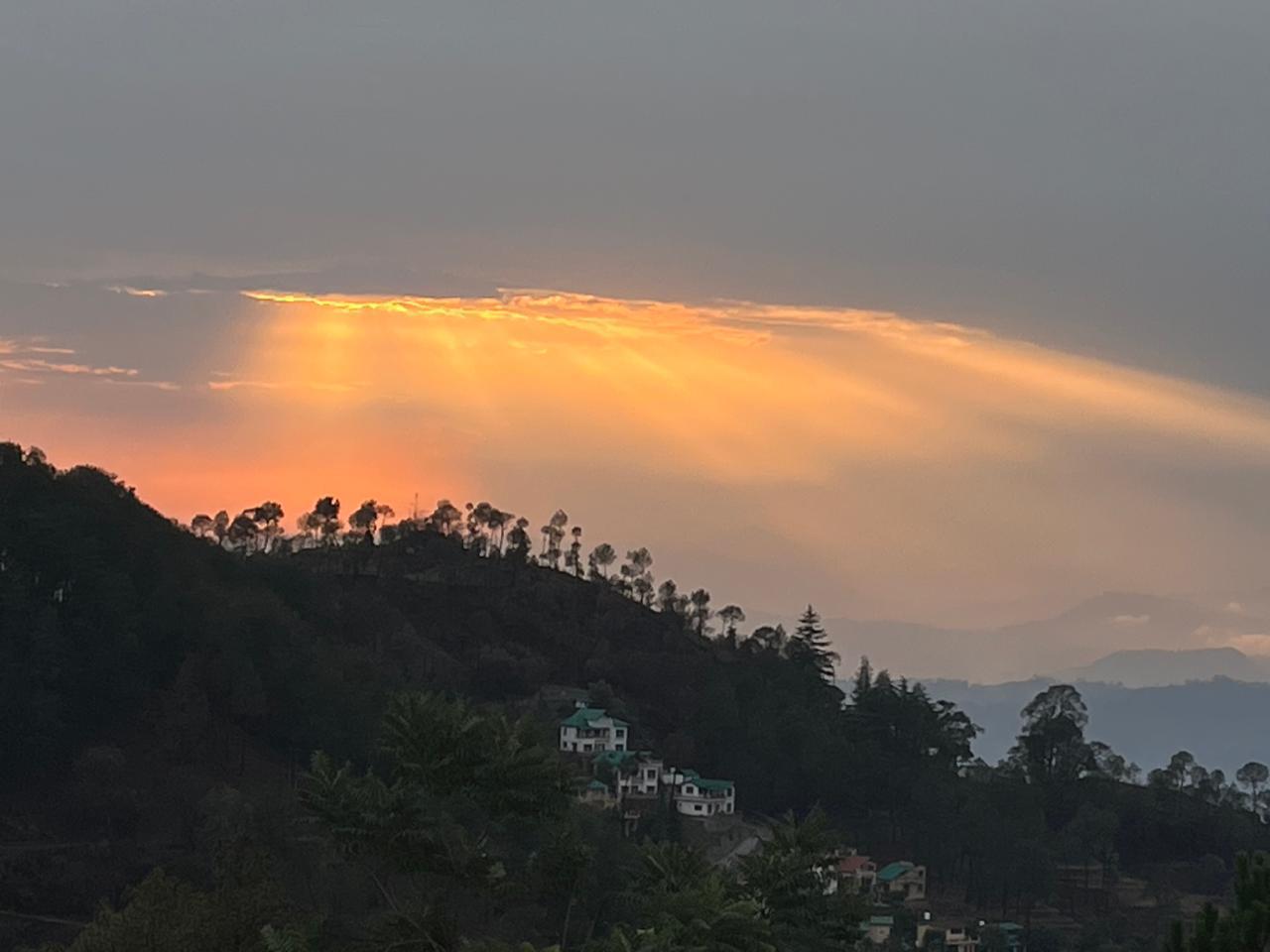 Golden clouds at sunset over the valley