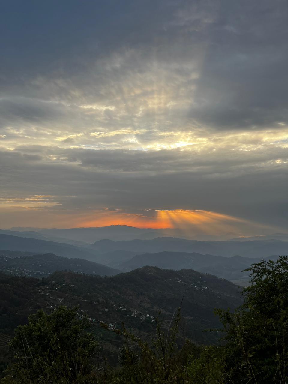 Divine sun rays piercing through clouds
